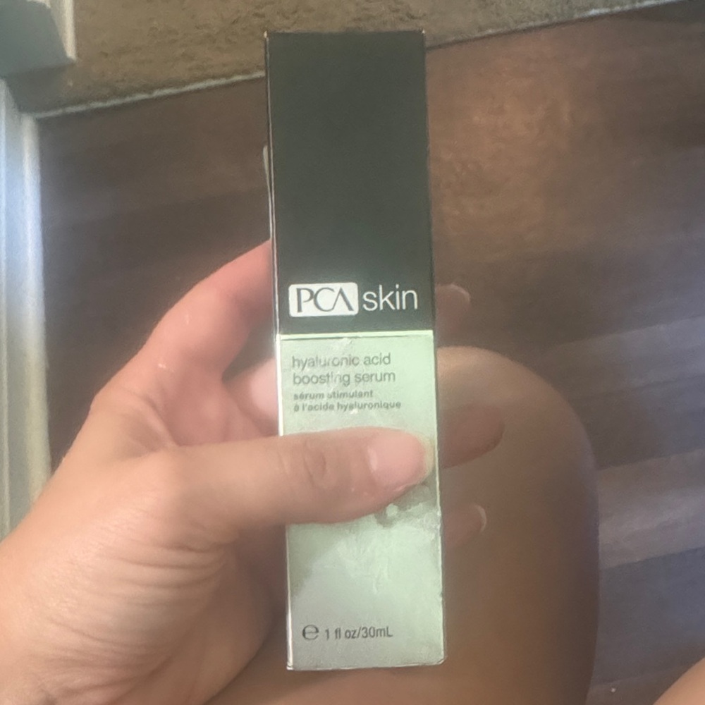 PCA Skin Hyaluronic Acid Boosting Serum - Black and White